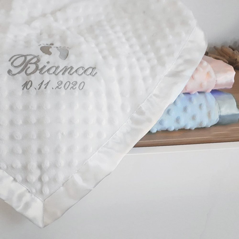 Baby blanket with name and date embroidered. Choose a name or your own text to embroider on your baby blanket. Available in 3 different colors.