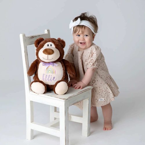 Little girl with teddy bear with name embroidered