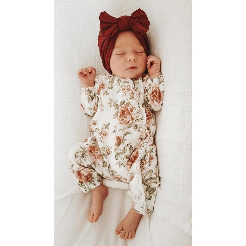 Newborn with burgundy hair band