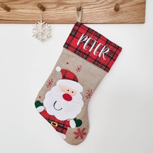 Christmas sock with Santa and checkered pattern